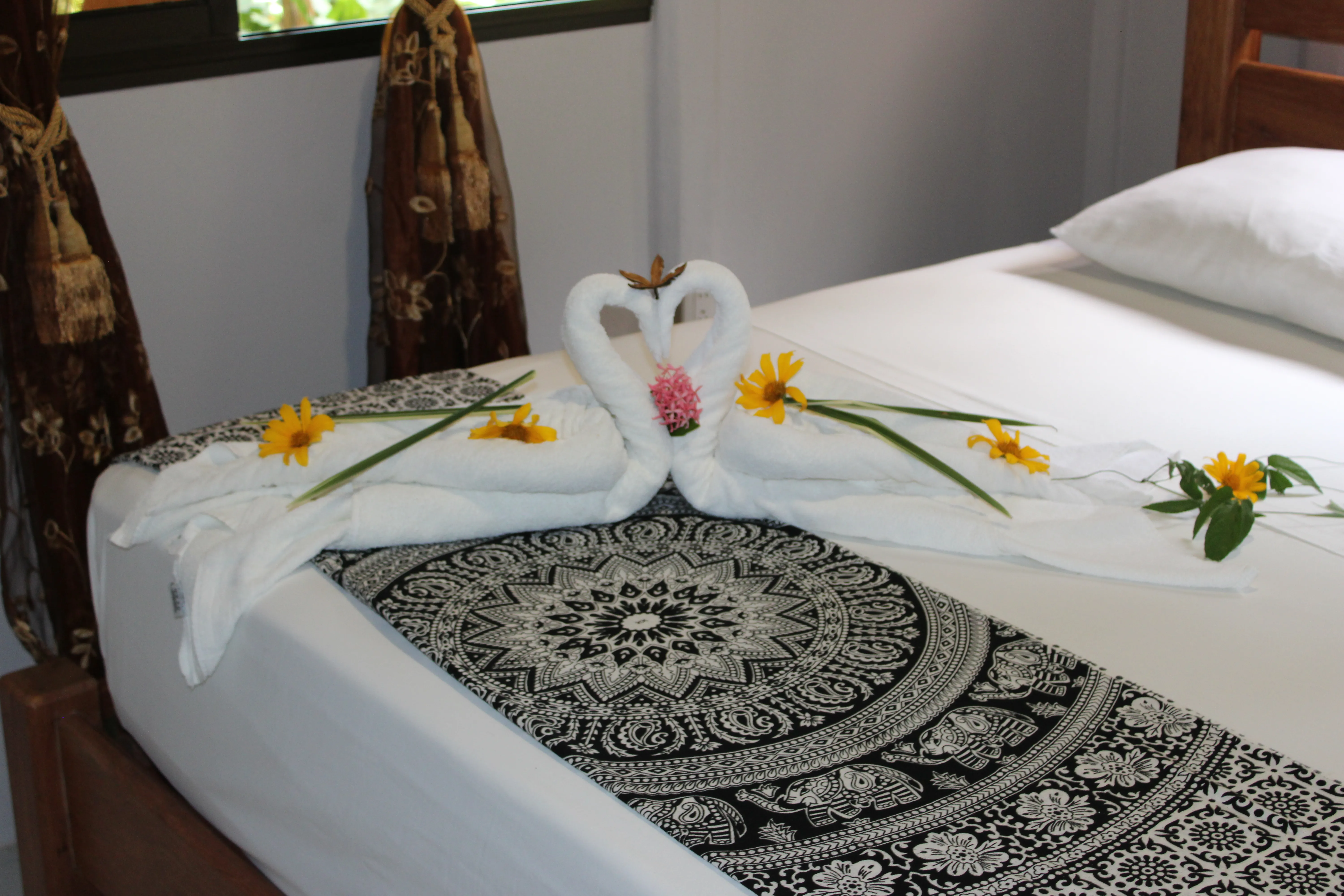 decoration of flowers on the bed